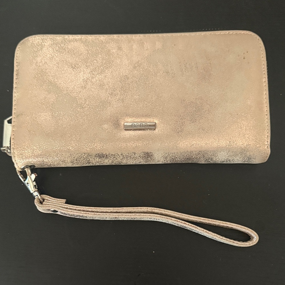 BCBG Metallic Gold Wristlet. Fits cell phone rustic gold look.